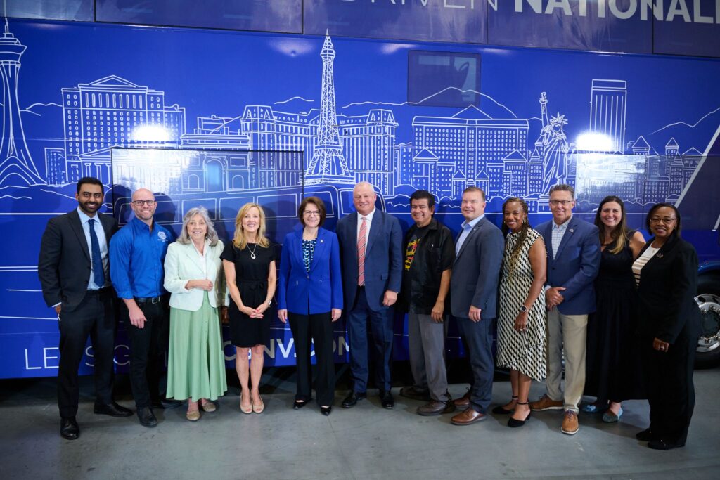 A group picture of RTC CEO M.J. Maynard-Carey; NFI Group president and CEO Paul Soubry; members of Nevada’s federal delegation, including U.S. senator Catherine Cortez Masto (D-NV) and congresswoman Dina Titus (D-NV); and North Las Vegas City councilman and RTC vice chairman Isaac Barron.